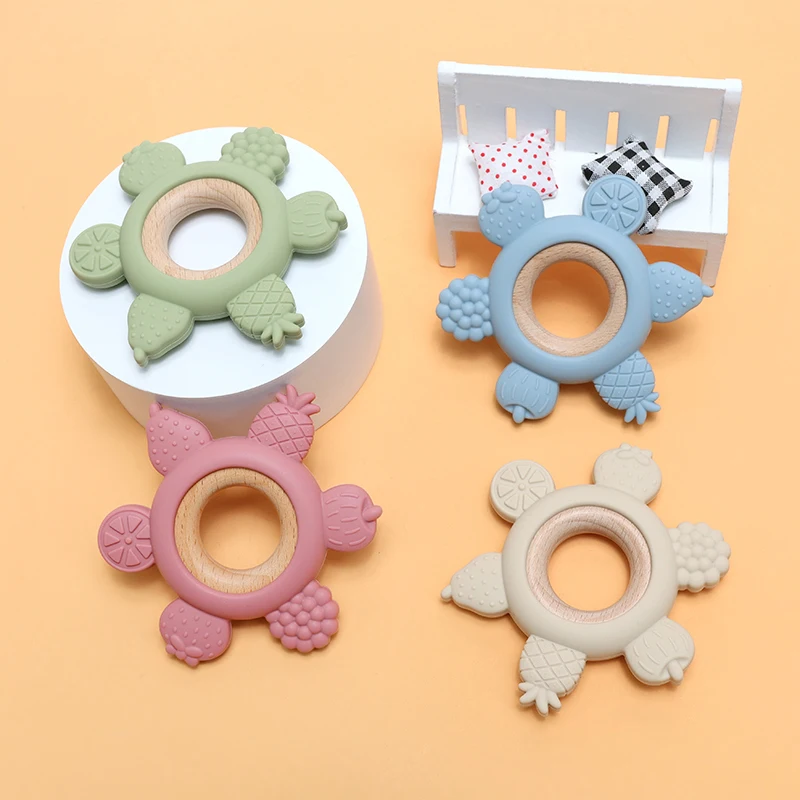 anneau de dentition en bois et silicone bleu